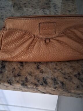 Cole Haan Pebbled Leather Wristlet Clutch in Tan